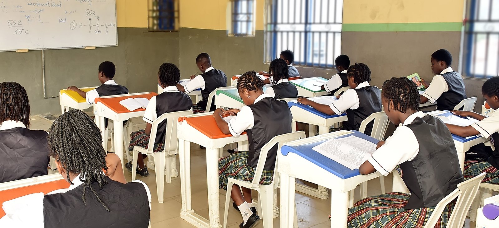 Apply To Blissful International School Ibadan Student writing exam